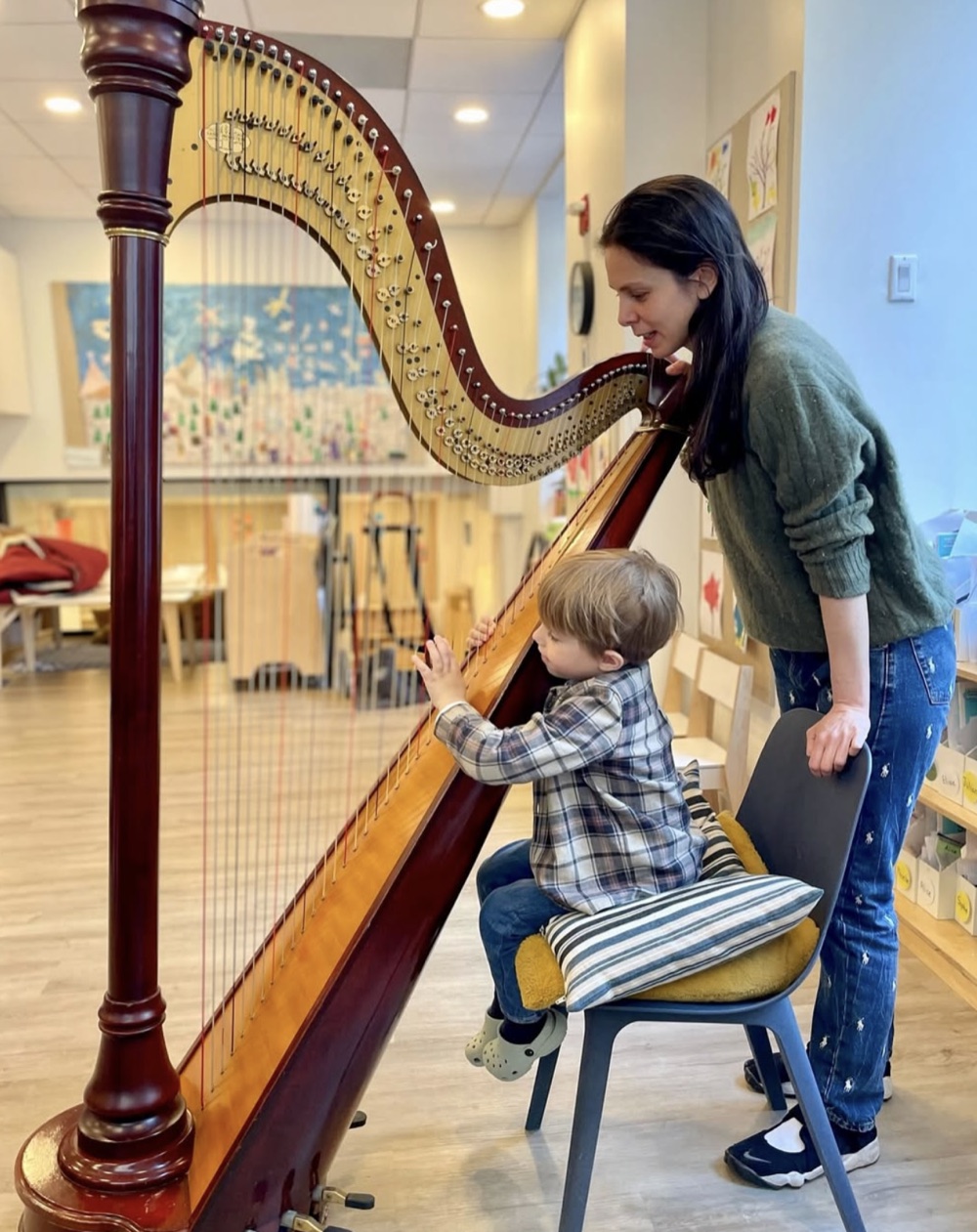 Harp lesson with student